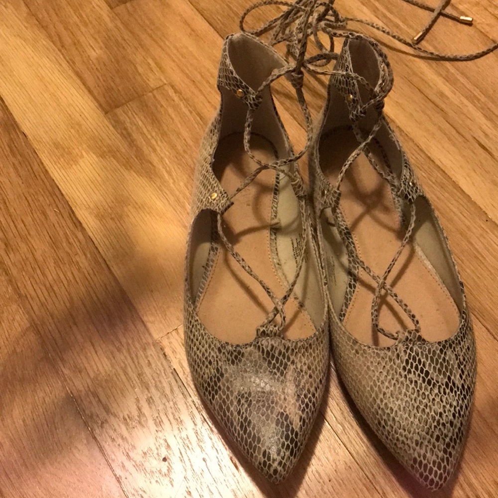 Snakeskin flats